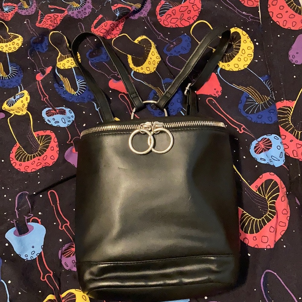 Used black mini backpack